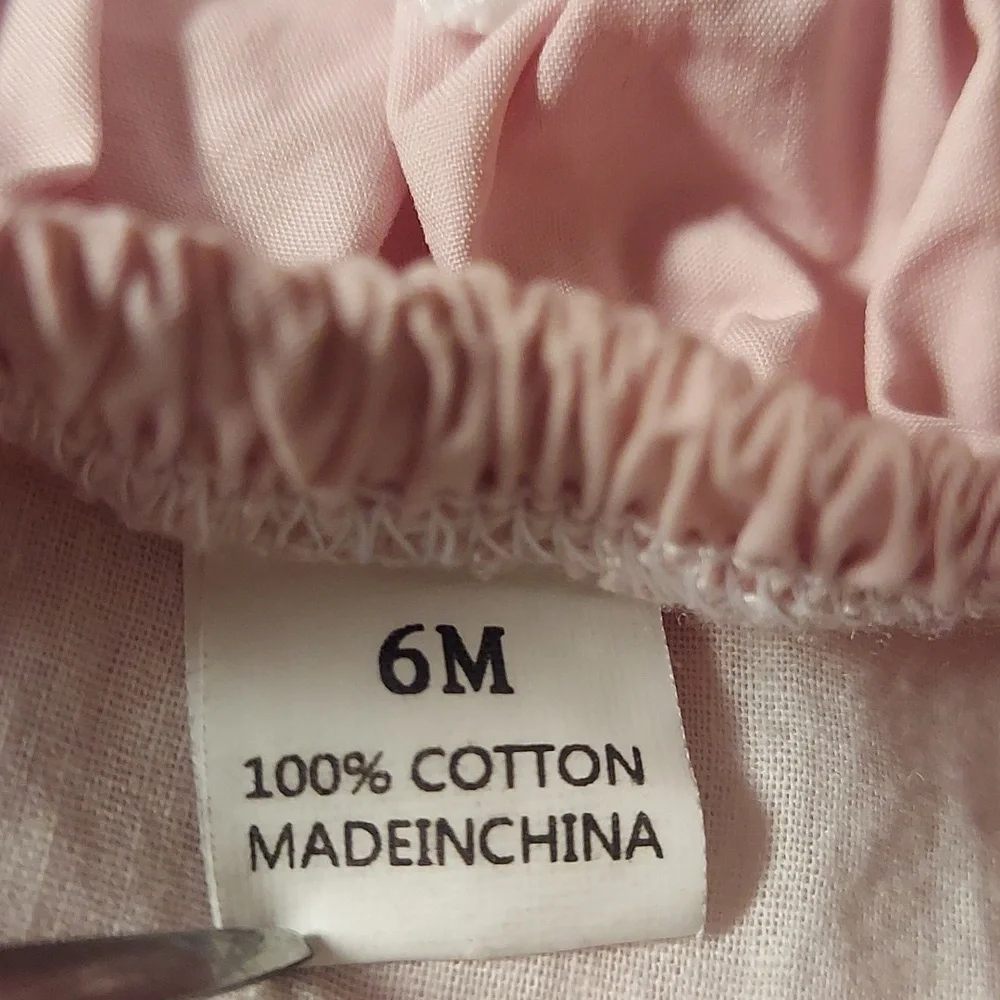 🎁 10/$25  Pink 9 month romper with halter neck and ruffle butt